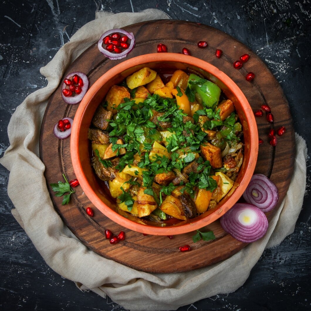 imgi_39_meat-stew-plate-with-potatoes-pepper-herbs-onion-pomegranate_176474-6839